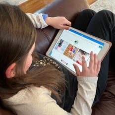 Child using Boom on a tablet.